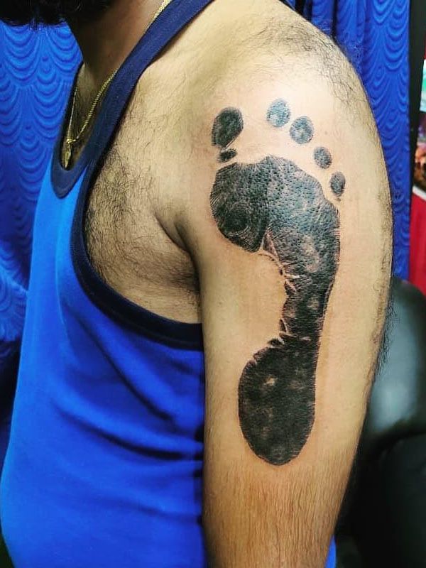 30 Wonderful Footprint Tattoos for Your Next Ink