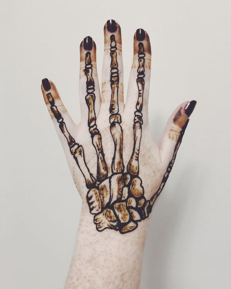 30 Unique Skeleton Hand Tattoos You Can Copy