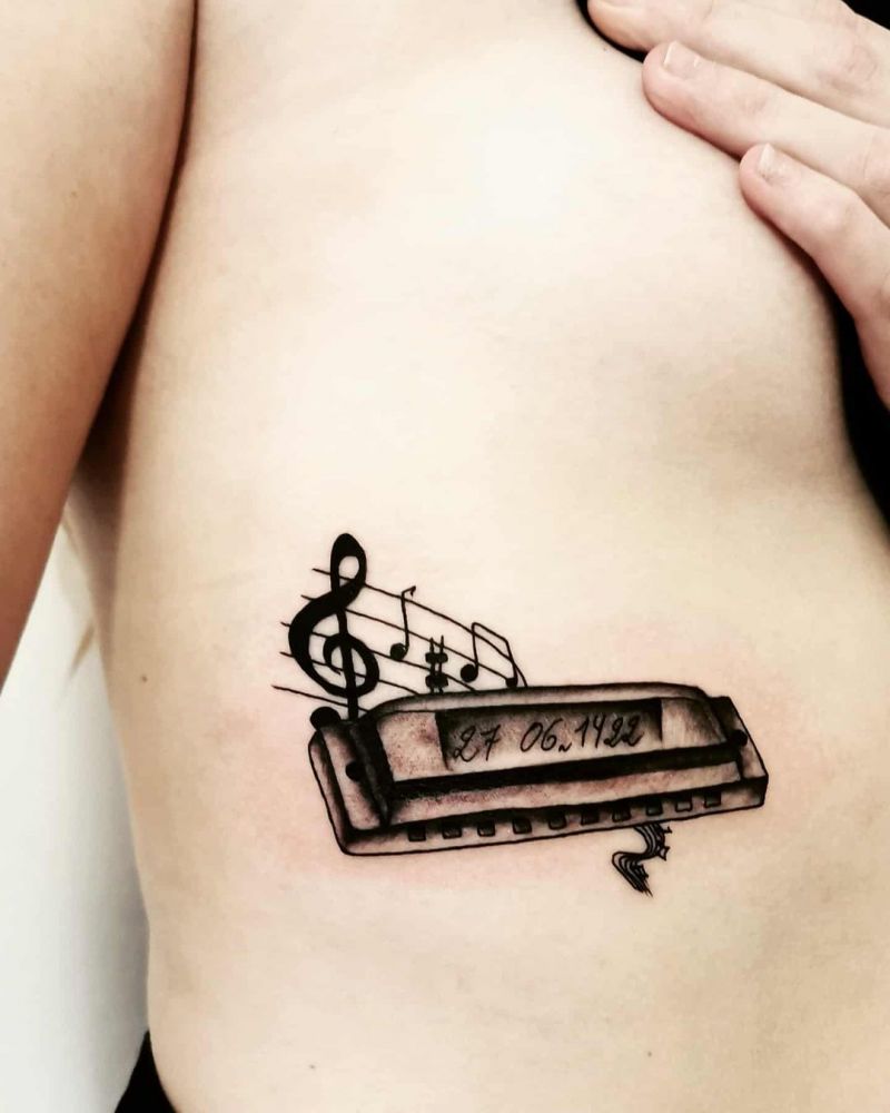 30 Elegant Harmonica Tattoos for Your Inspiration