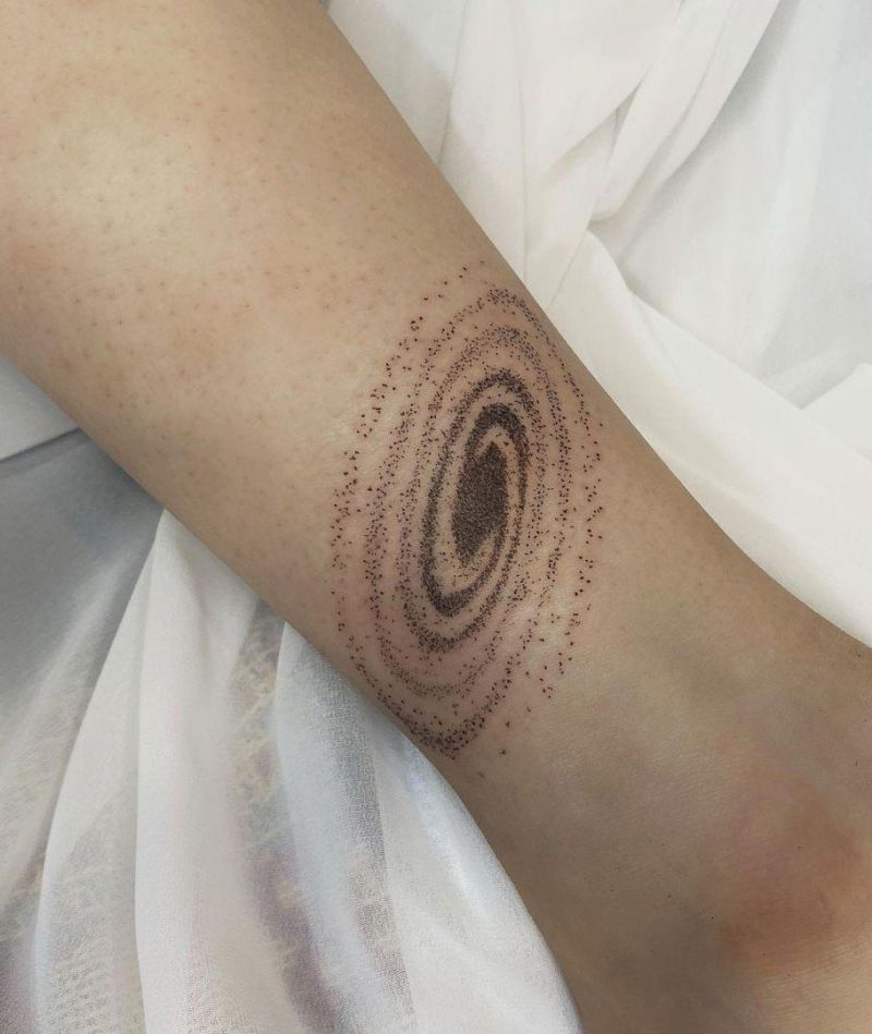 30 Unique Black Hole Tattoos for Your Inspiration