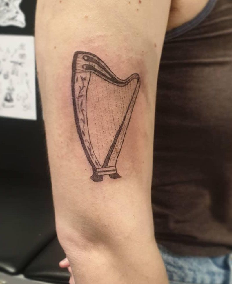 30 Elegant Harp Tattoos You Can Copy