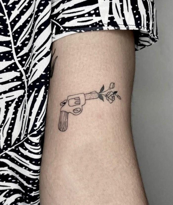 30 Unique Gun Tattoos You Must Love