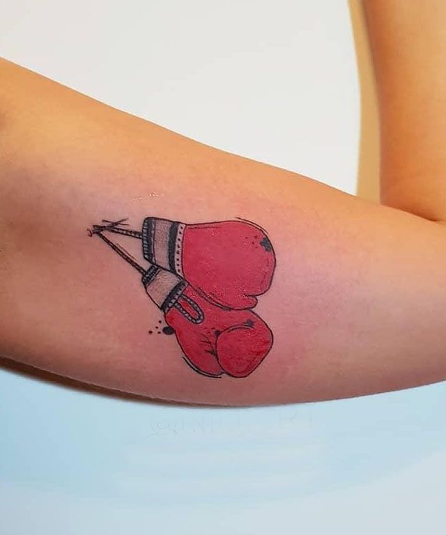 Red Boxing Glove Tattoo on Arm