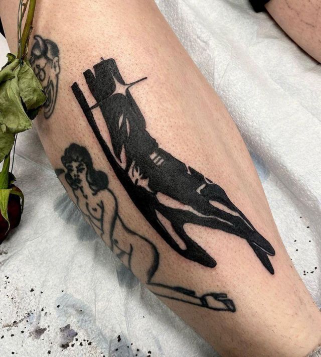 Black Glove Tattoo on Leg