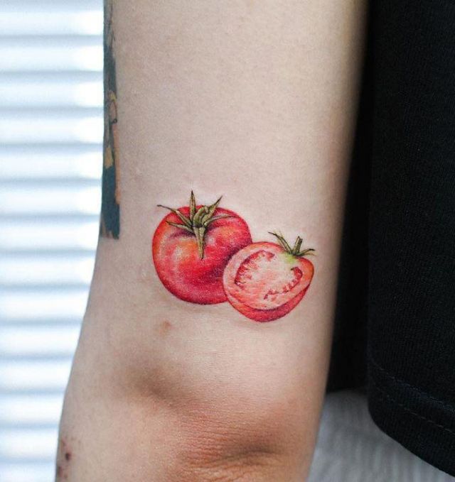 Realistic Tomato Tattoo on Arm