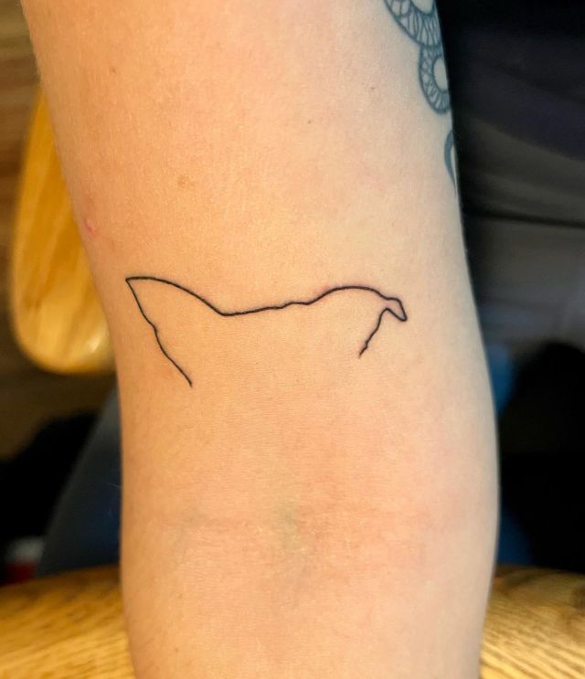 Simple Dog Ear Tattoo on Arm