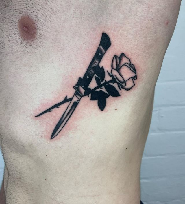 Rose Switchblade Tattoo on Side Body