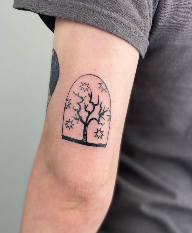 Small Dead Tree Tattoo on Upper Arm