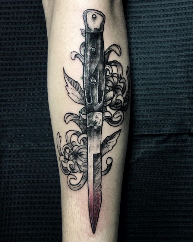 Chrysanthemum Switchblade Tattoo on Leg