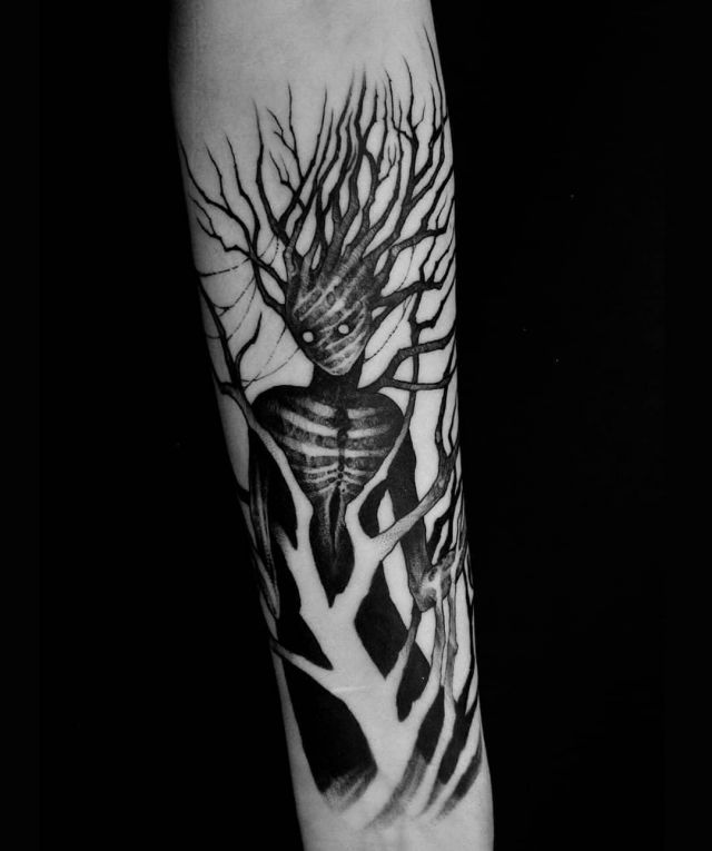 Black Dead Tree Tattoo on Arm