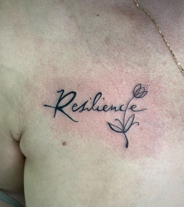 Resilience Tattoo with Flower on Chest
