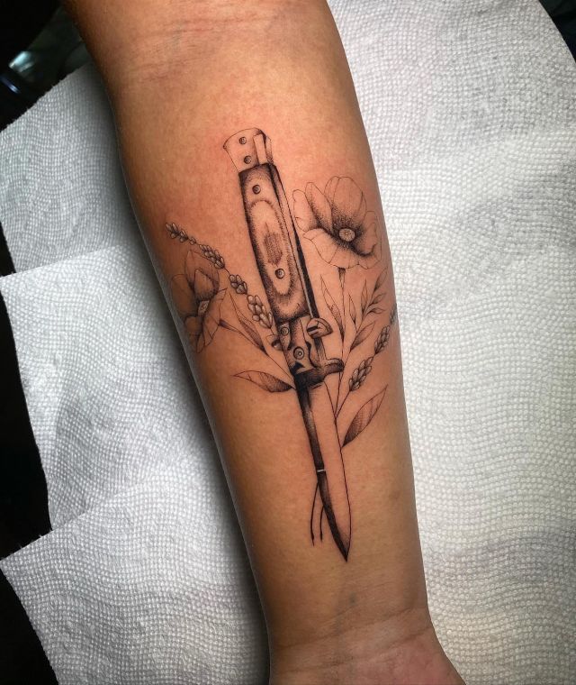 Flower Switchblade Tattoo on Leg