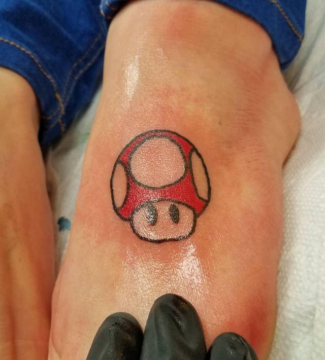 Red Mario Mushroom Tattoo on Leg