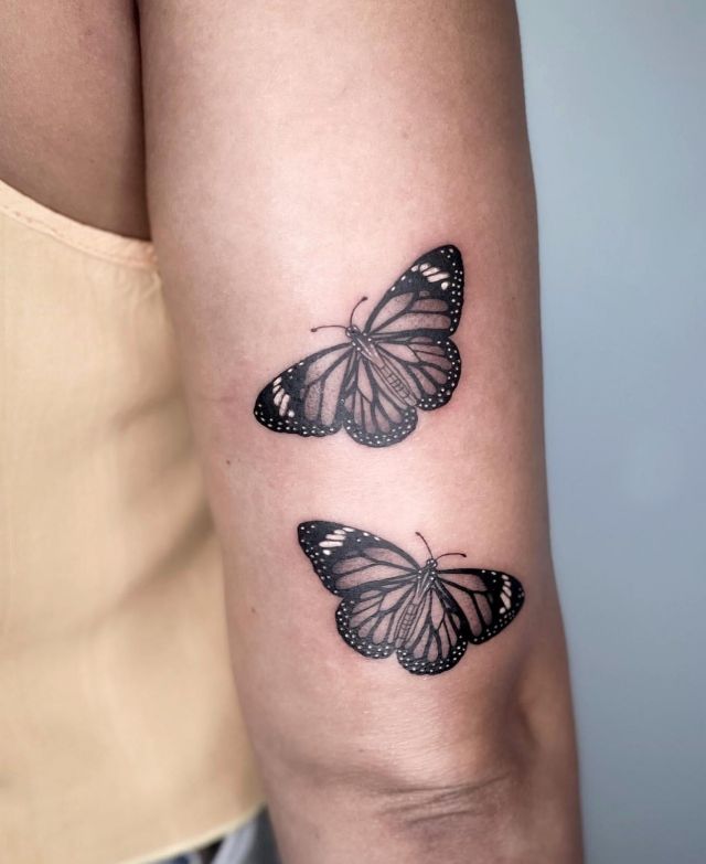 Two Monarch Butterflies Tattoo on Upper Arm