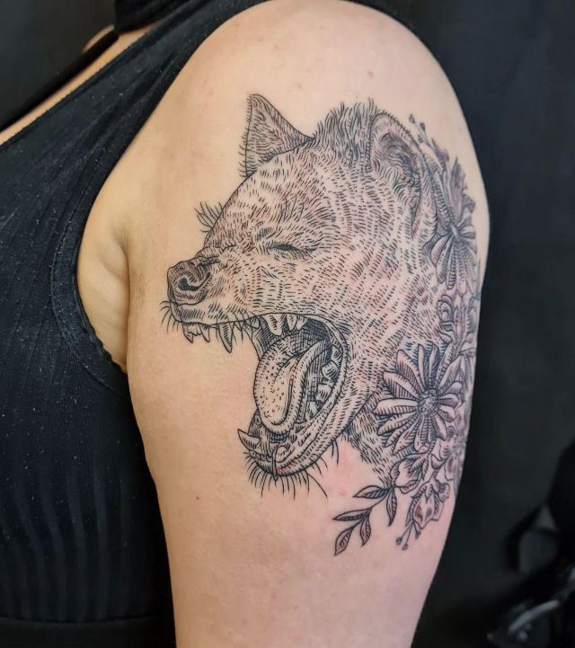 Hyena Tattoo with Flower on Shoulder
