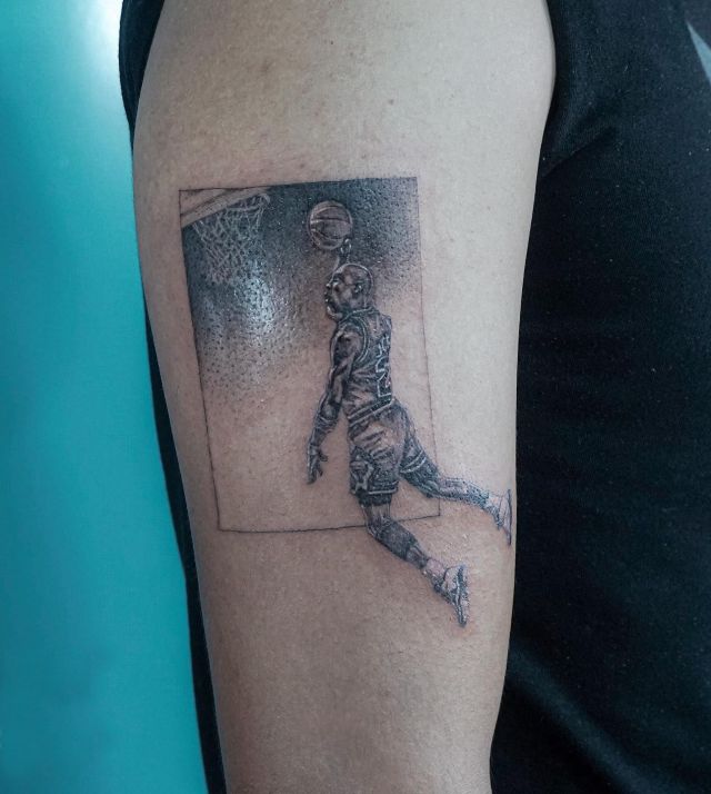 Michael Jordan Shooting Tattoo on Upper Arm