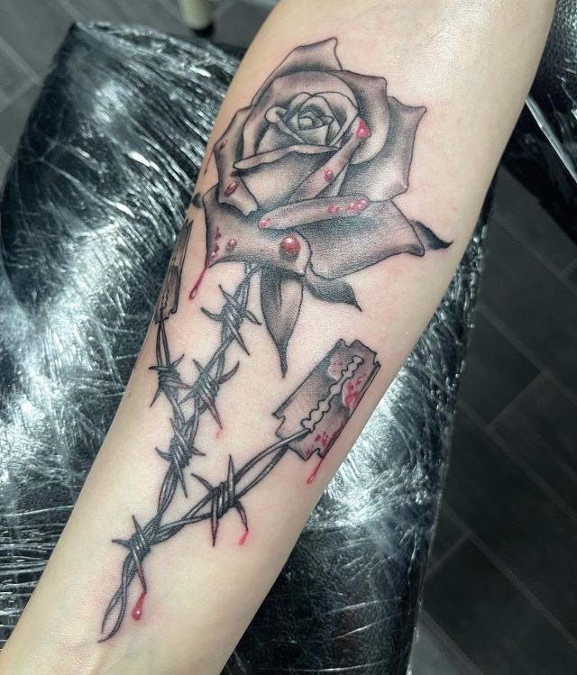 Rose Razor Blade Tattoo on Arm