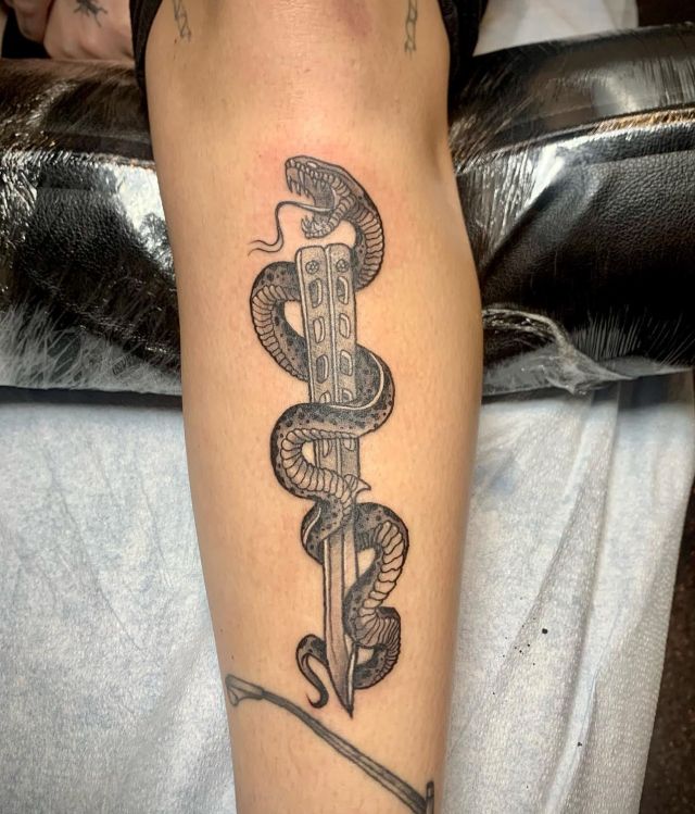 Snake Switchblade Tattoo on Leg