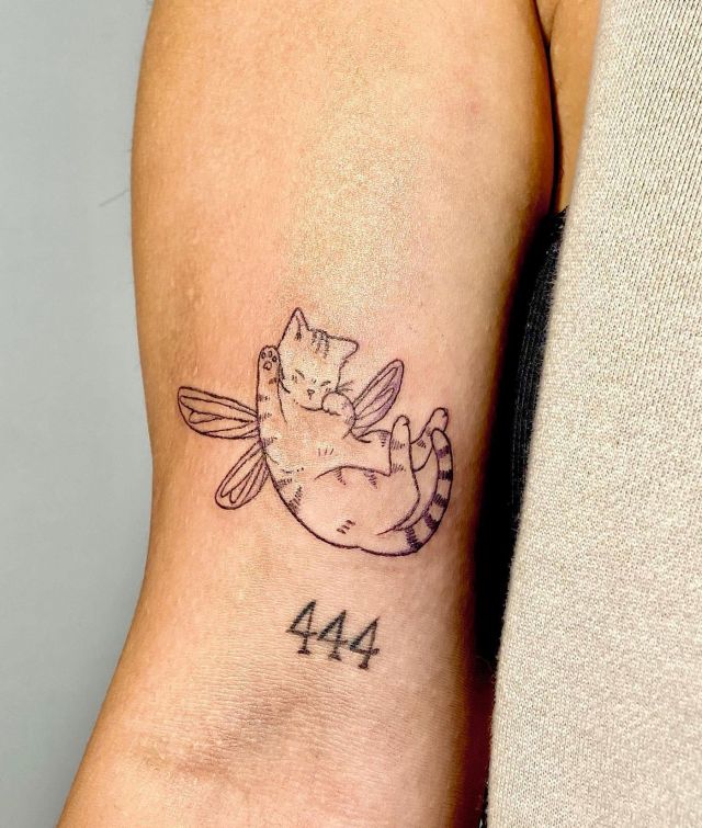 Happy Fairy Cat Tattoo on Upper Arm