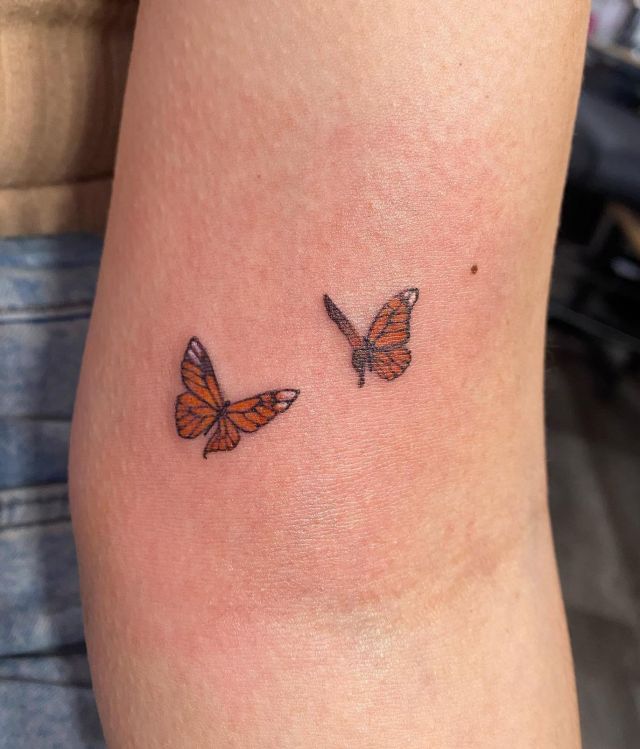 Two Cute Monarch Butterflies Tattoo on Arm