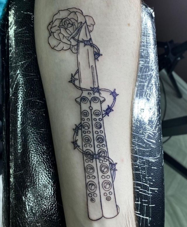 Barbed Wire Switchblade Tattoo on Leg