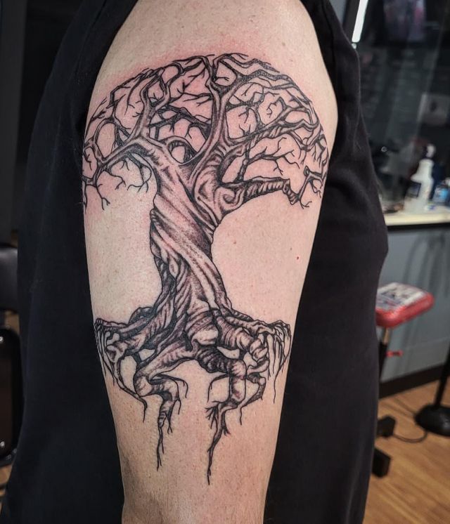 Unique Dead Tree Tattoo on Upper Arm