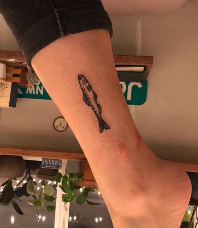 Small Anchovy Tattoo on Leg