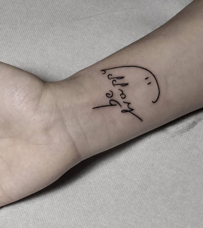 Simple Be Happy Tattoo on Wrist