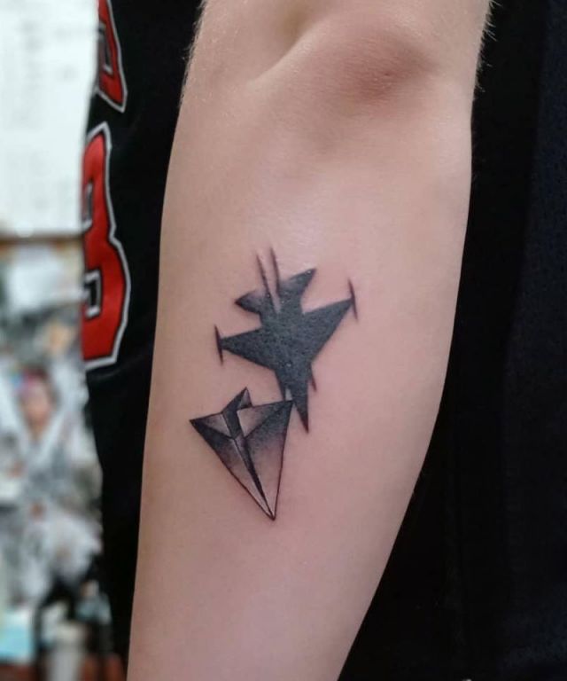 Paper Jet Tattoo on Forearm