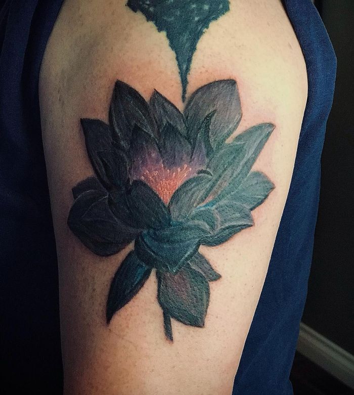 Beautiful Black Lotus Tattoo on Upper Arm