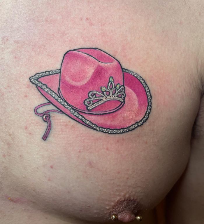 Beautiful Pink Cowboy Hat Tattoo on Chest