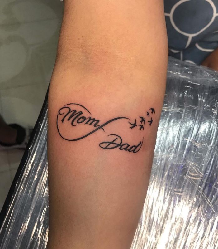 Infinite Mom Dad Tattoo with Birds on Arm