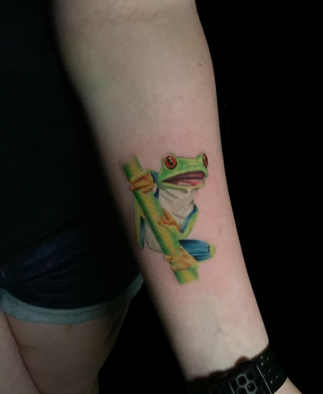 Green Tree Frog on Branch Tattoo on Wrist