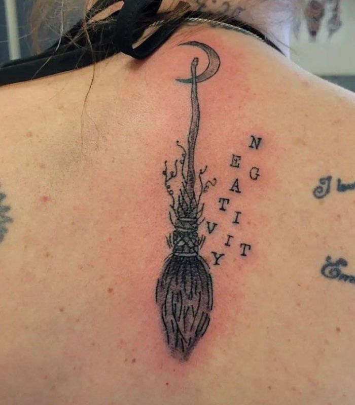 Unique Broom Tattoo on Back