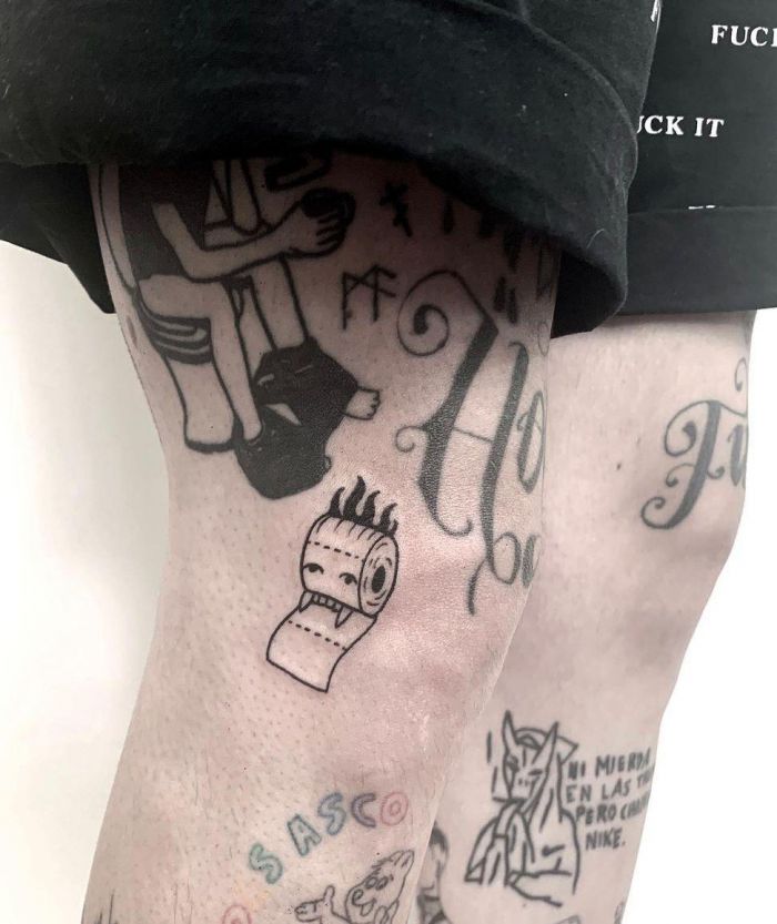 Toilet Paper Tattoo with Demon's Tooth on Leg