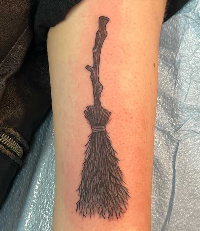 Cool Broom Tattoo on Arm